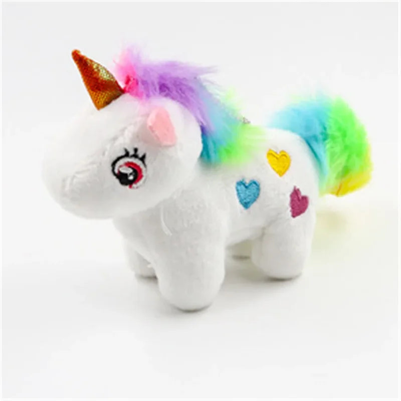 Mini peluche licorne blanche sur fond blanc