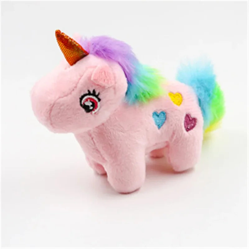 Mini peluche licorne rose sur fond blanc