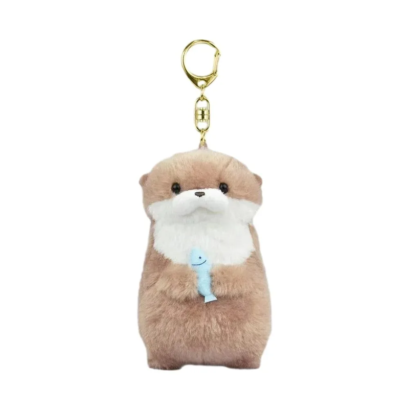 Mini peluche loutre avec son poisson sur un fond blanc