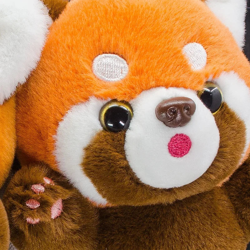 Mini peluche panda roux zoom sur la tête