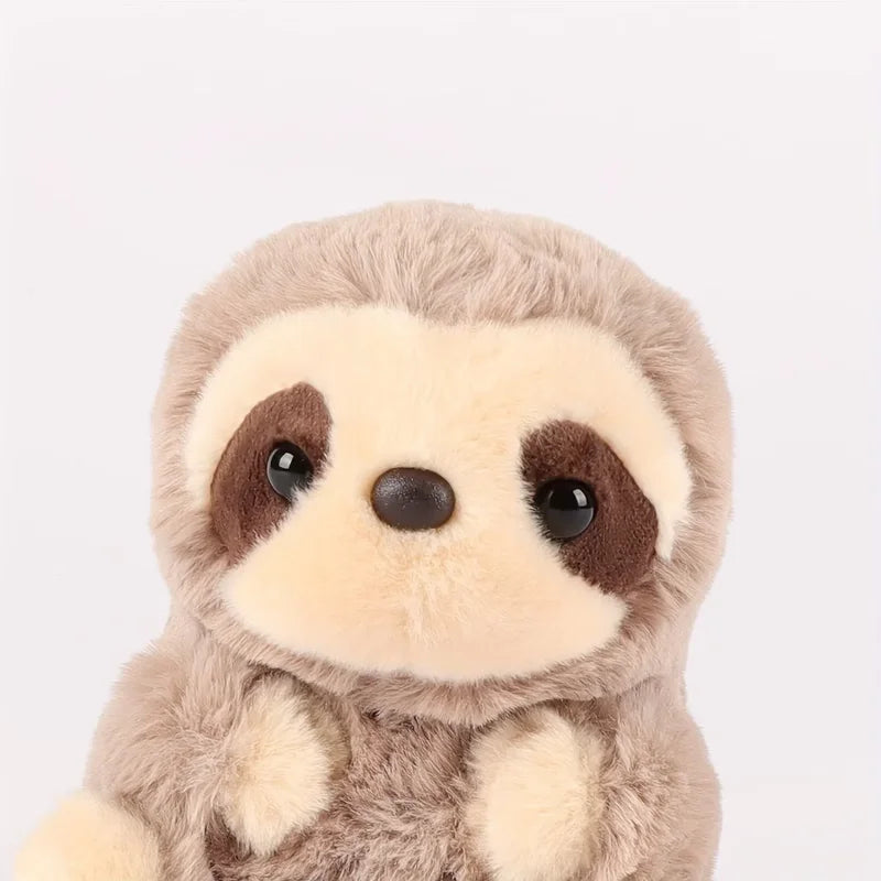 Zoom sur la tête de la peluche paresseux Image