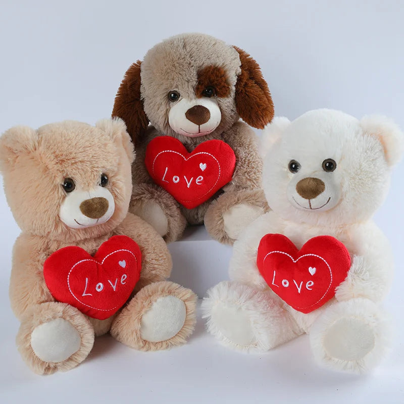 Trois ours en peluches avec un coeur Image