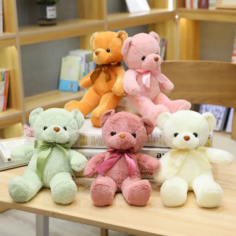 Cinq ours en peluche couleur émotion sur une table Image