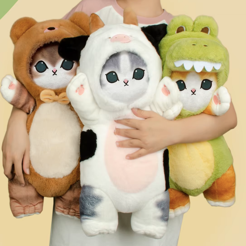 Trois peluches chats déguisés Image