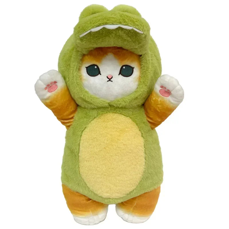 Peluche chat déguisé en dinosaure sur fond blanc