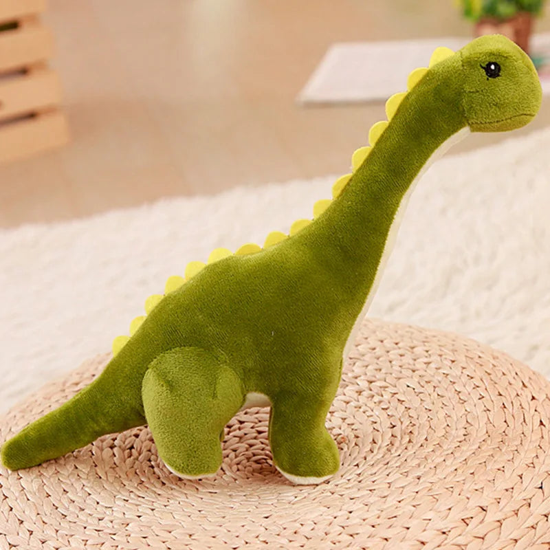 Peluche diplodocus verte réaliste sur un support en osier