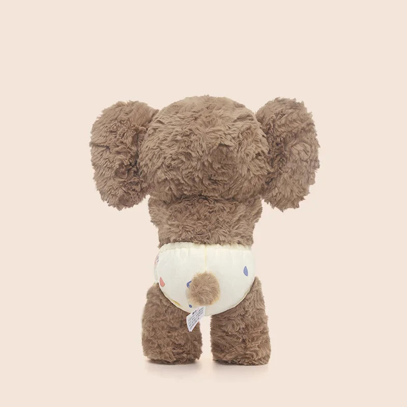 Peluche éléphanteau debout de dos en se cachant les yeux Image