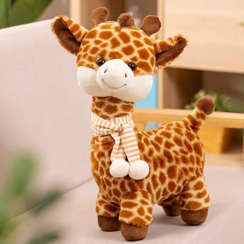 Une peluche girafe avec son écharpe sur un canapé Image