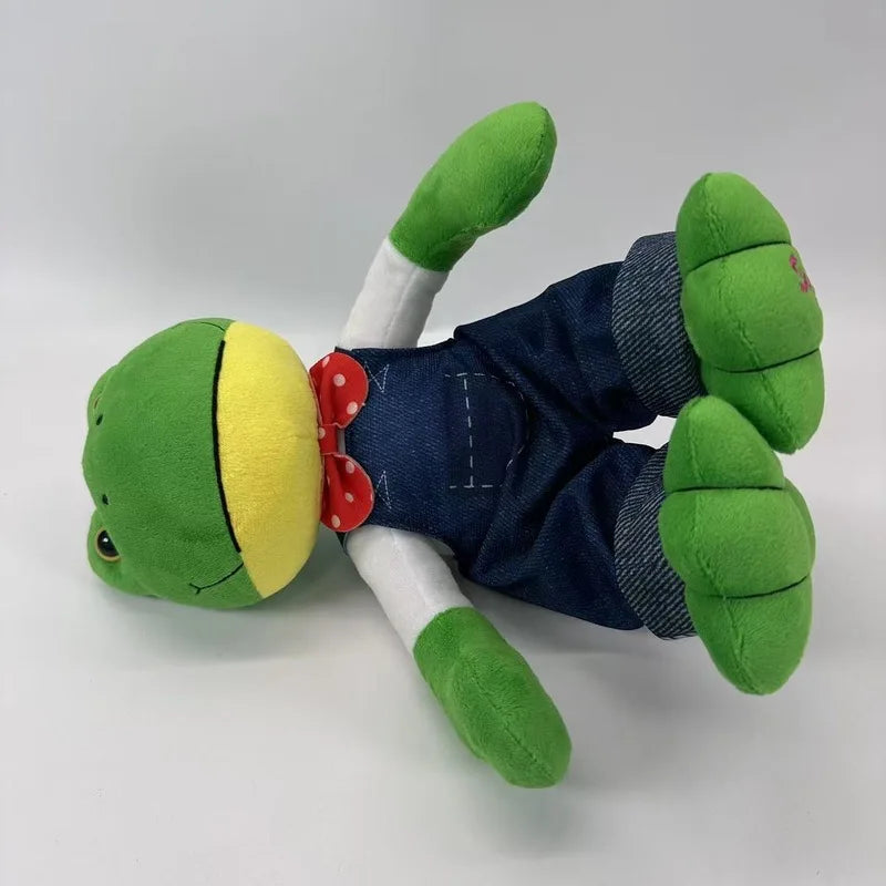 Peluche grenouille en salopette morte