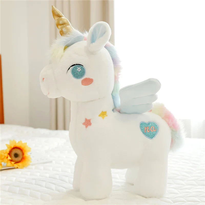 Peluche licorne bleu fantaisie sur un lit  Image