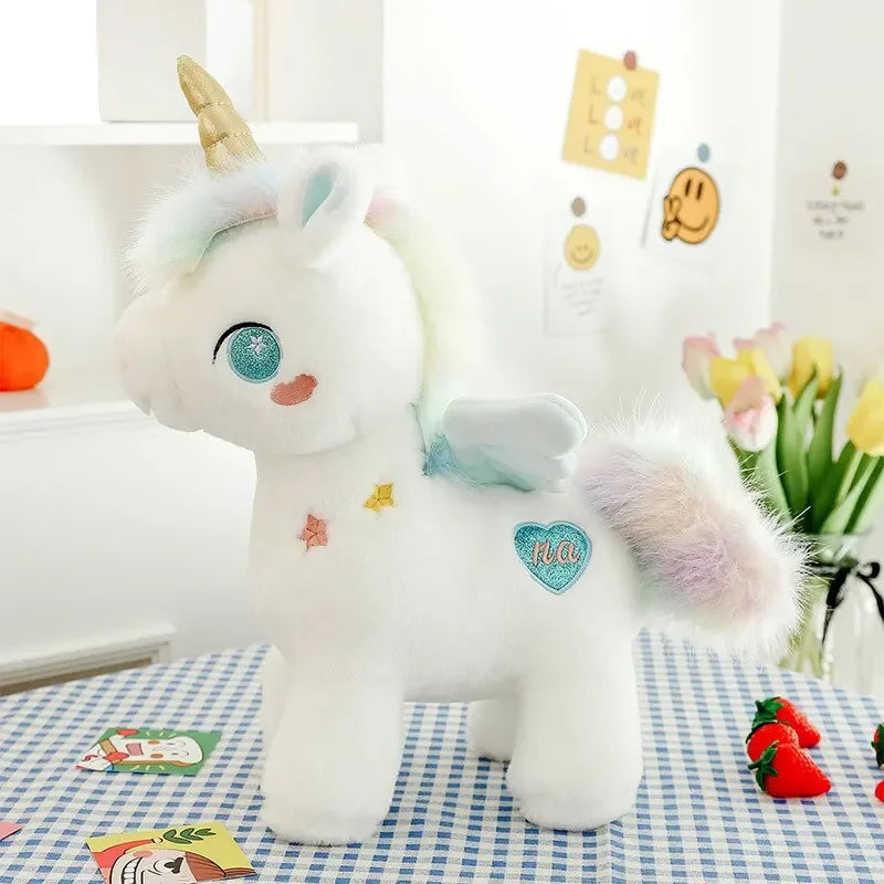 Peluche licorne bleue fantaisie sur une nappe bleue
