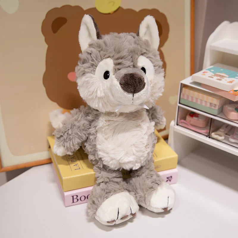 Peluche loup douce sur des livres Image