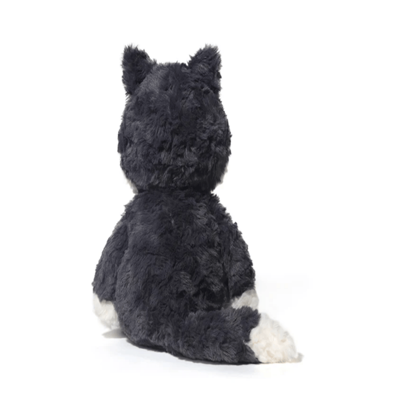 Peluche loup gris foncé assis de dos sur fond blanc Image