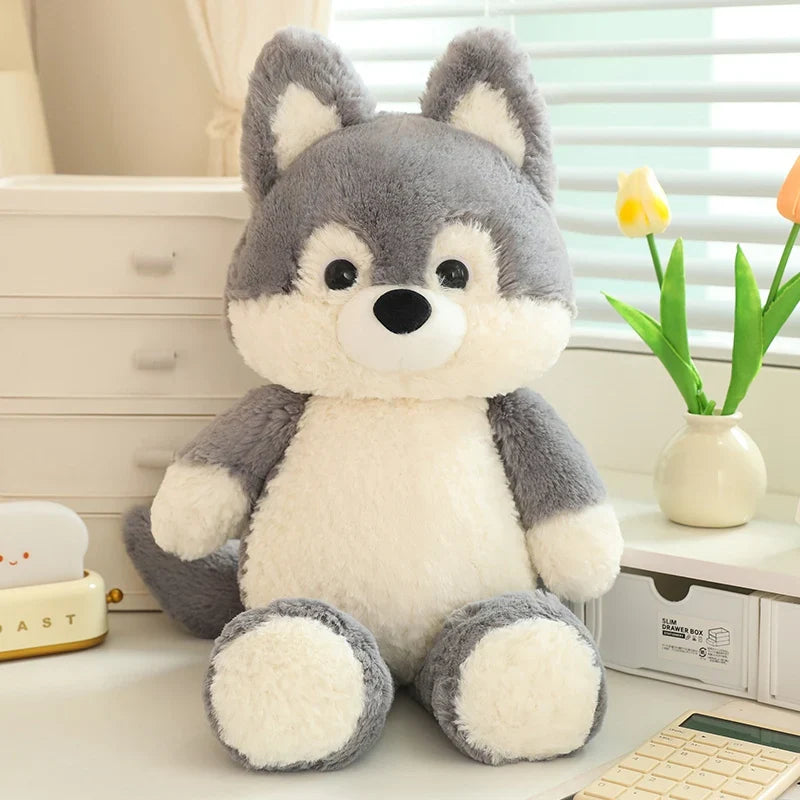 Peluche loup nu dans une chambre