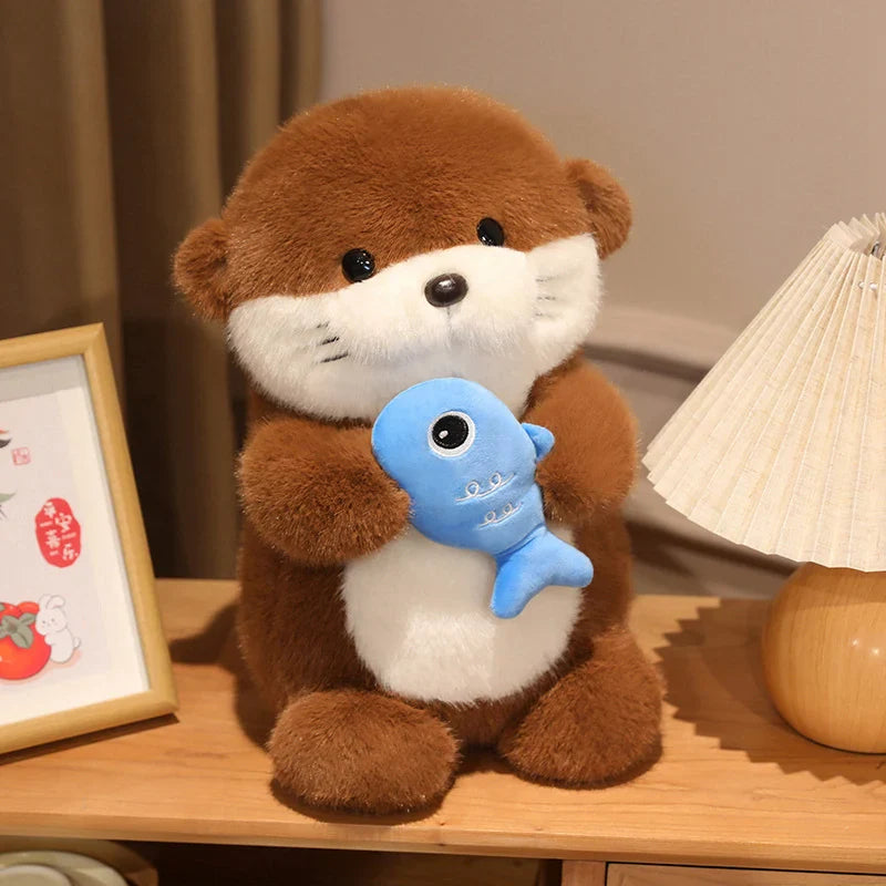 Peluche loutre avec son poisson Kawaii sur un meuble Image
