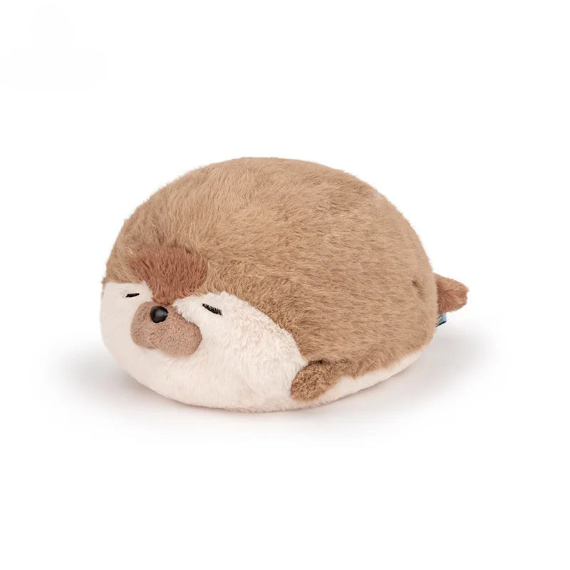 Peluche loutre marron de mer sur un fond blanc