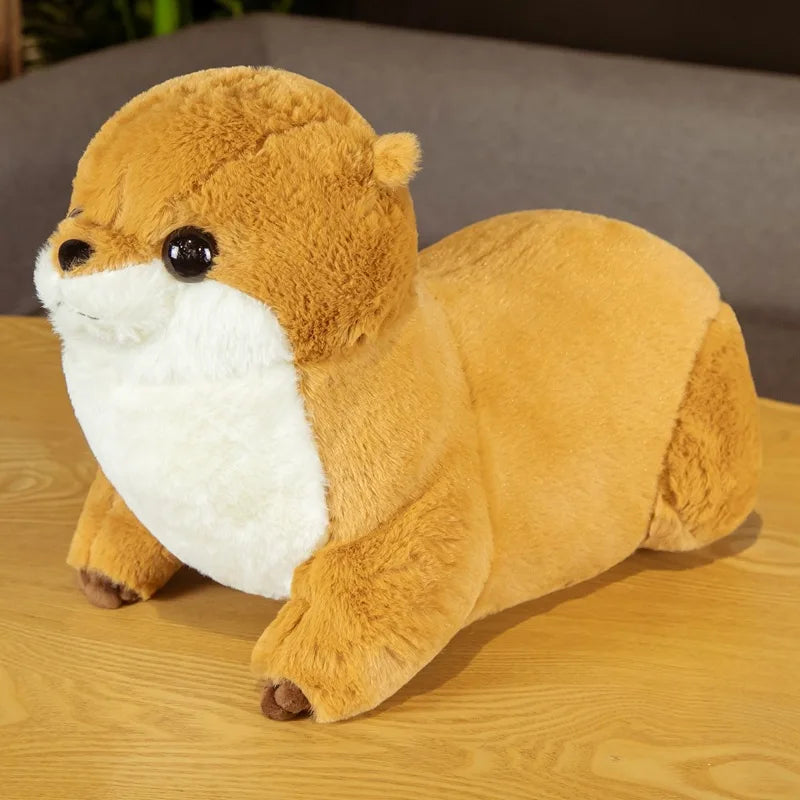 Peluche loutre brune réaliste sur une table Image