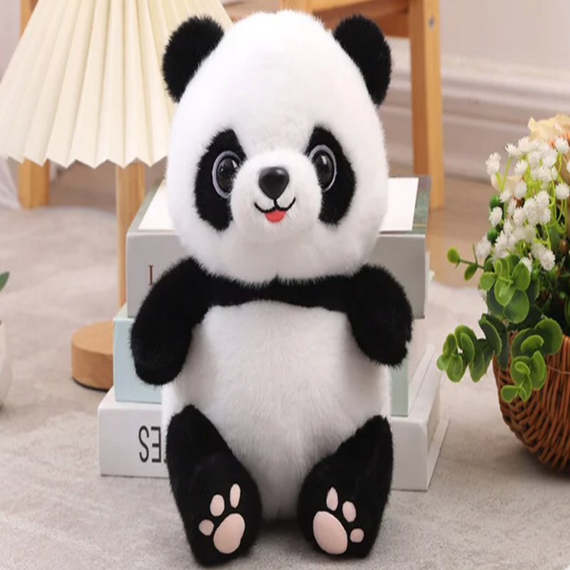 Peluche panda mignonne assise sur une moquette