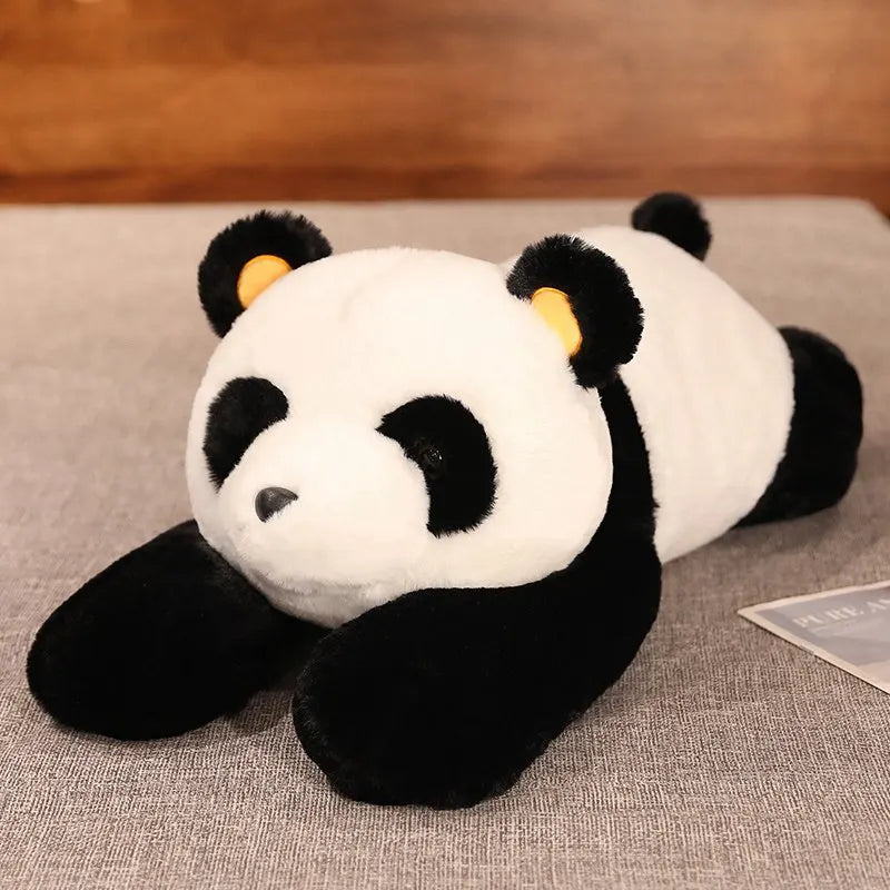 Peluche panda xxl sur un tapis