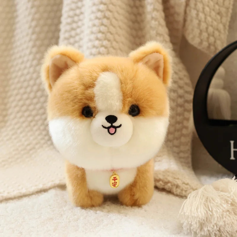 Peluche petit chien corgi sur un tapis 