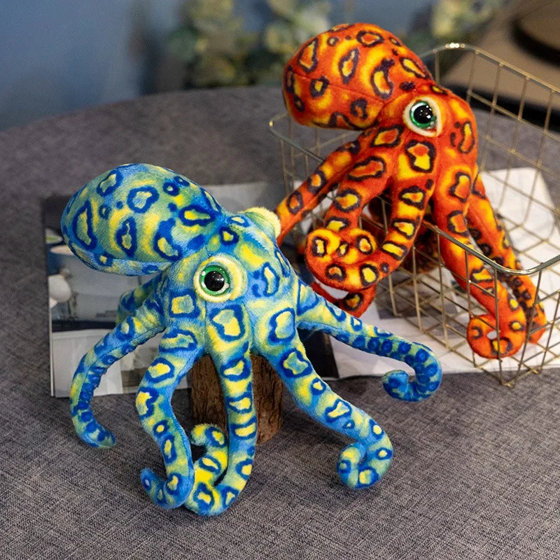 Deux peluches pieuvres tachetés sur un tabouret