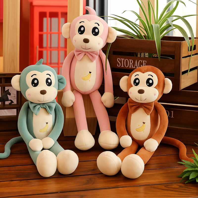 Trois peluches singes cartoon assis sur le parquet Image
