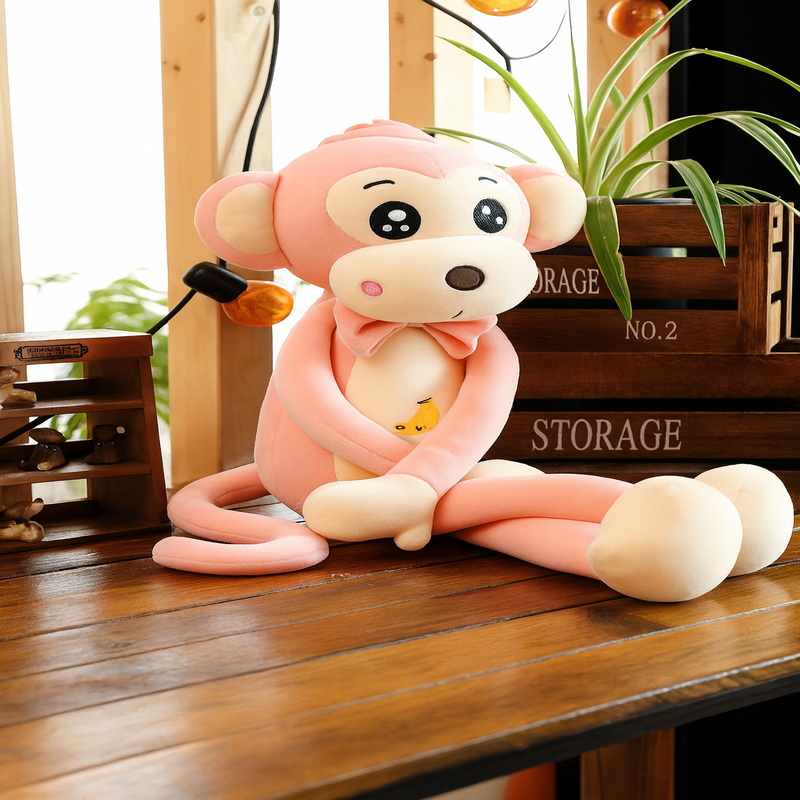Peluche singe rose cartoon sur un parquet Image