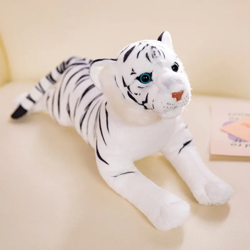 Peluche tigre blanc douce sur un tapis Image