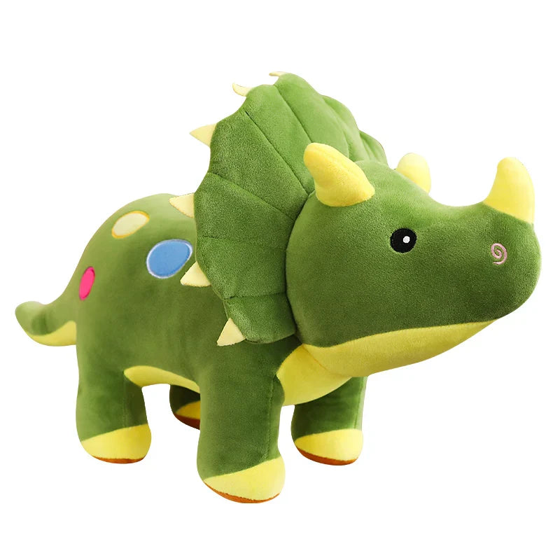 Peluche tricératops vert sur fond blanc 