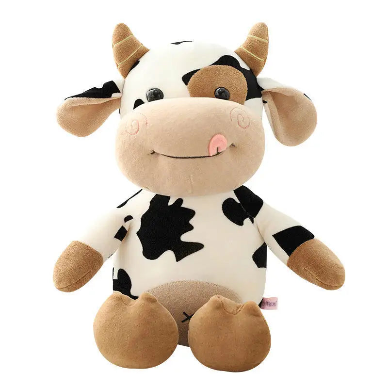 Peluche vache nu sur fond blanc
