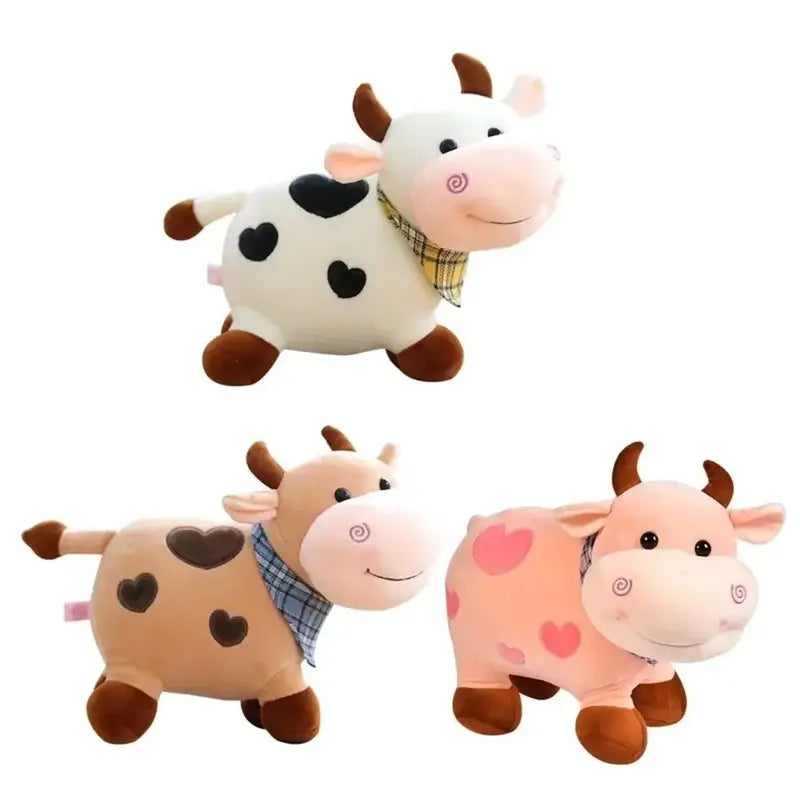 Trois peluches vaches cartoon sur fond blanc 