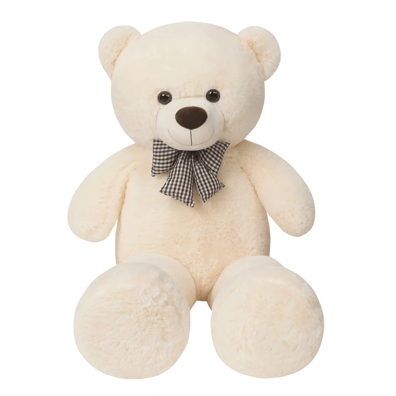 ours blanc en peluche géante avec noeud papillon sur un fond blanc