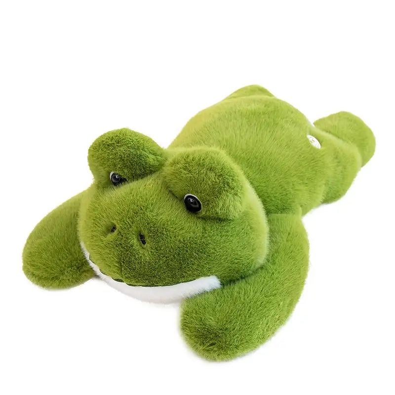 peluche grenouille oreiller sur fond blanc