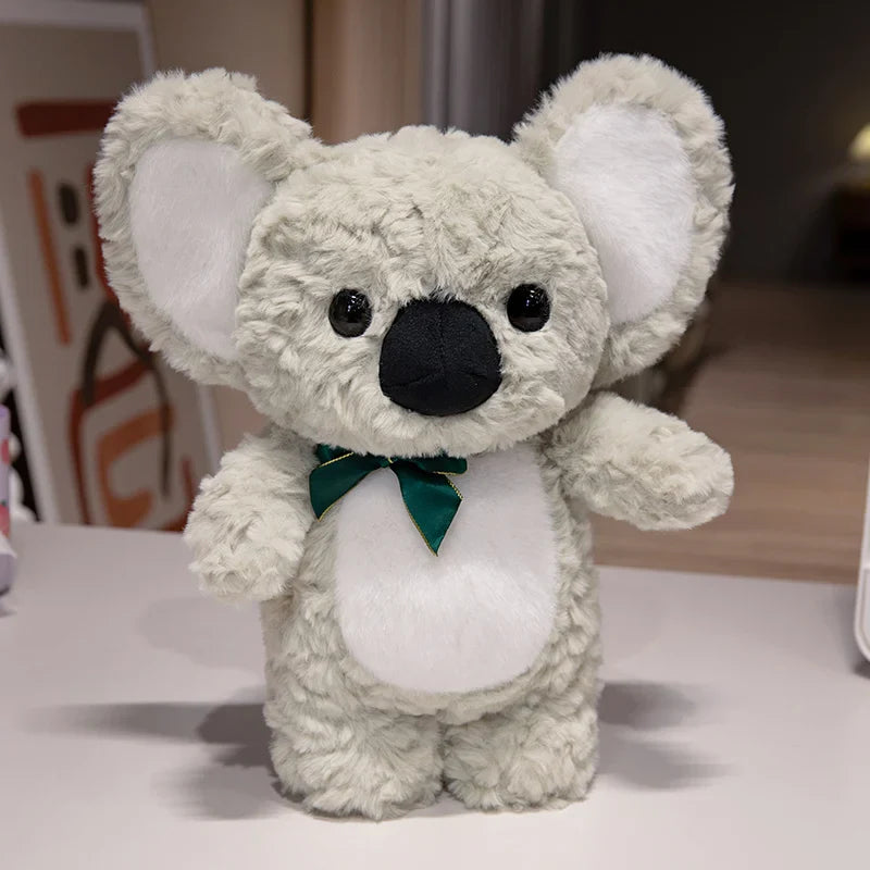 Peluche koala blanc super douce debout sur une table Image
